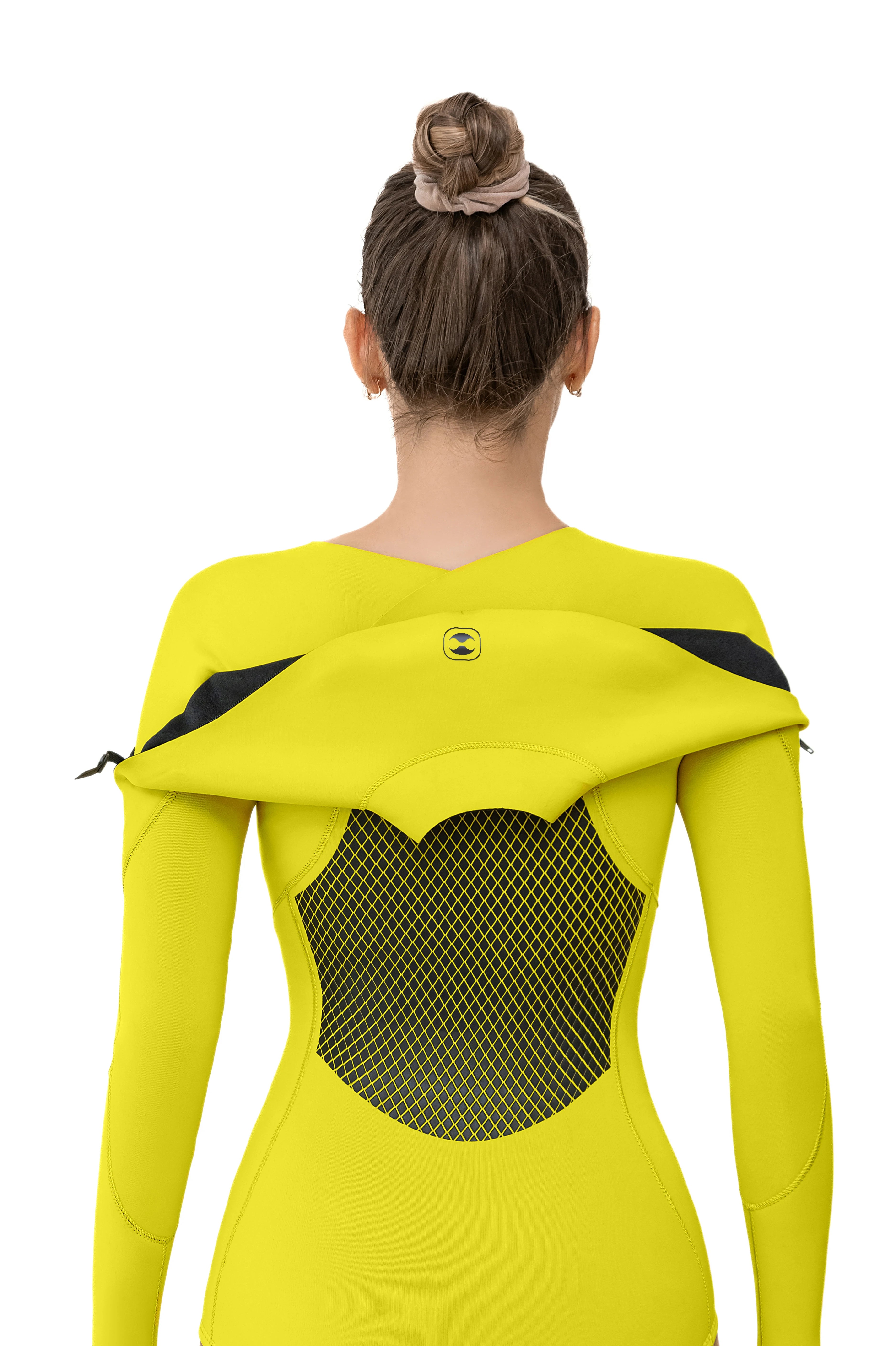 A woman shown from the back wearing a bright yellow long-sleeve long chest zip wetsuit with black mesh paneling and black shoulder details, against a plain white background.